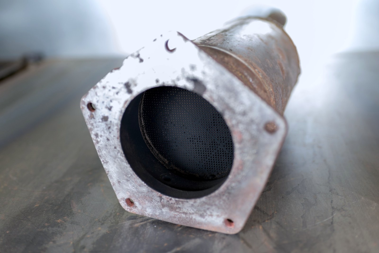 Front face of a removed particulate filter before cleaning, the channels are clogged