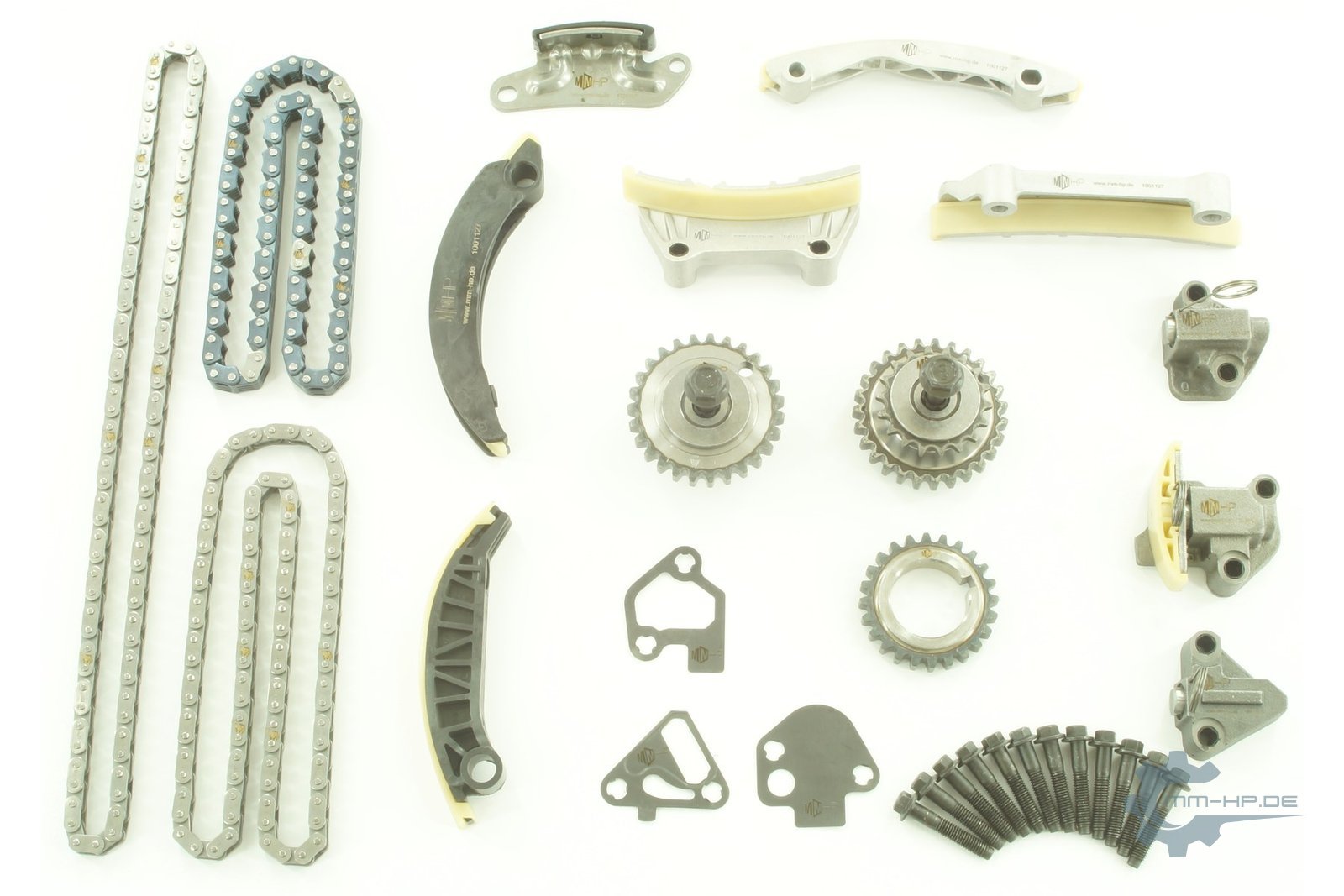 Individual parts of a timing chain kit as new parts: chains, sprockets, rails, tensioners, gaskets and bolts