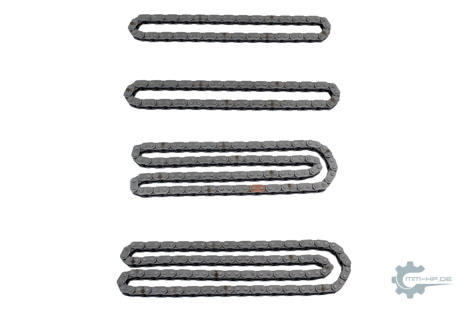 Four new timing chains of different lengths, laid out in loops
